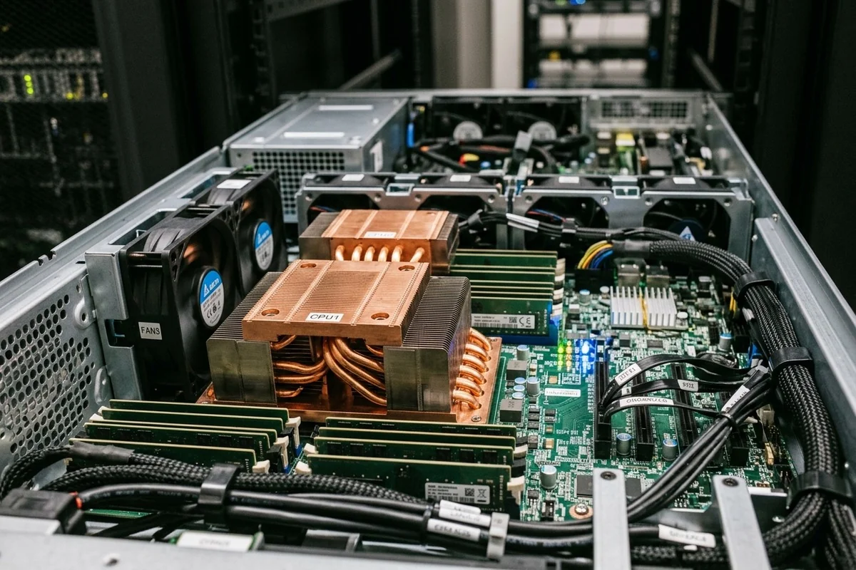 Scarpian AI - Enterprise server chassis interior with copper heatsinks and modular memory
