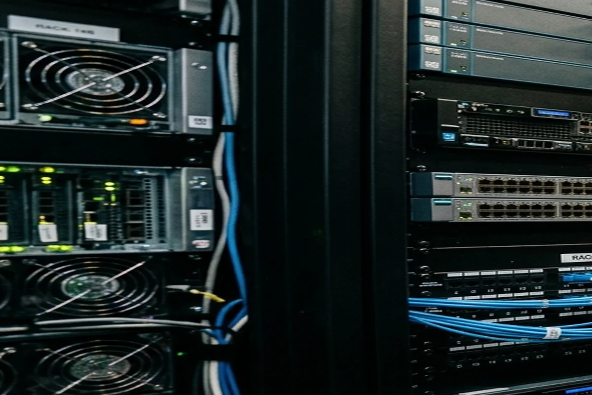 Scarpian AI - Enterprise network switch ports and fiber optic cabling in isolated security rack